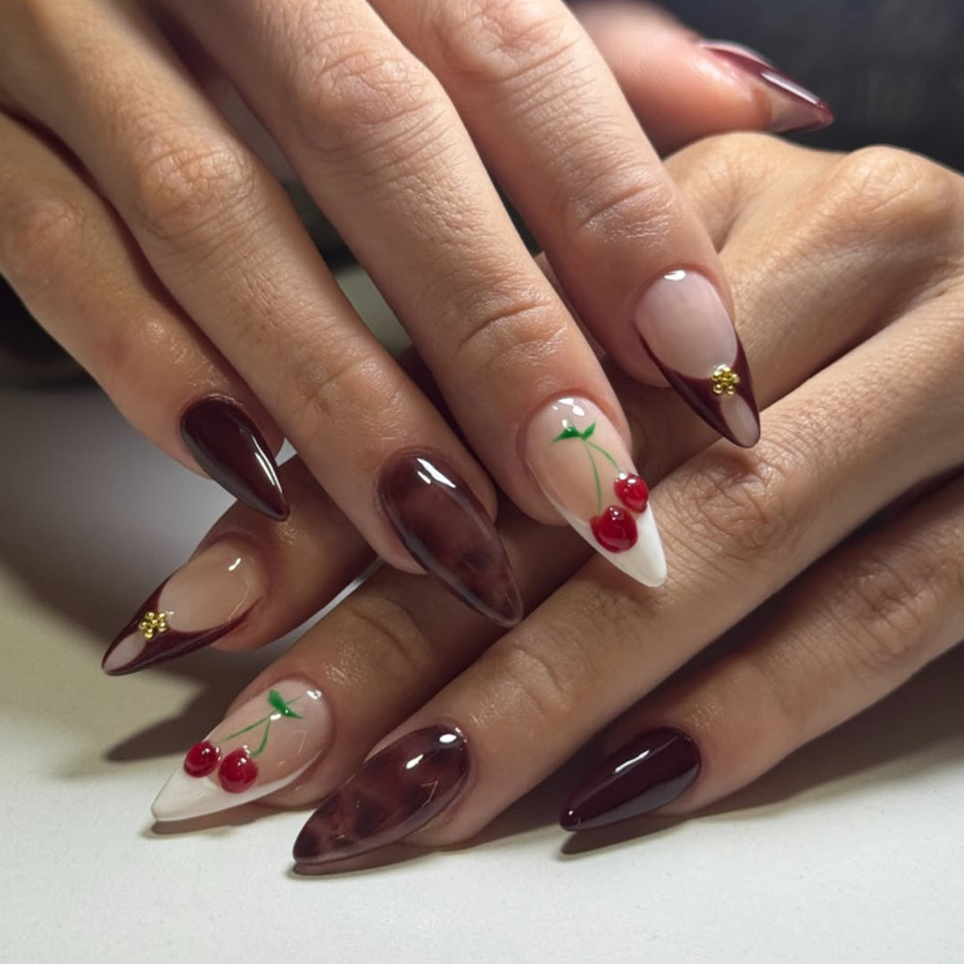 Artificial nail art with cherry blossom design Kalsten