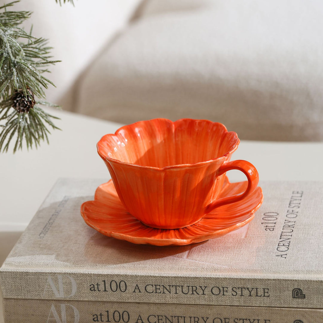 Ceramic mug with saucer in flower shape