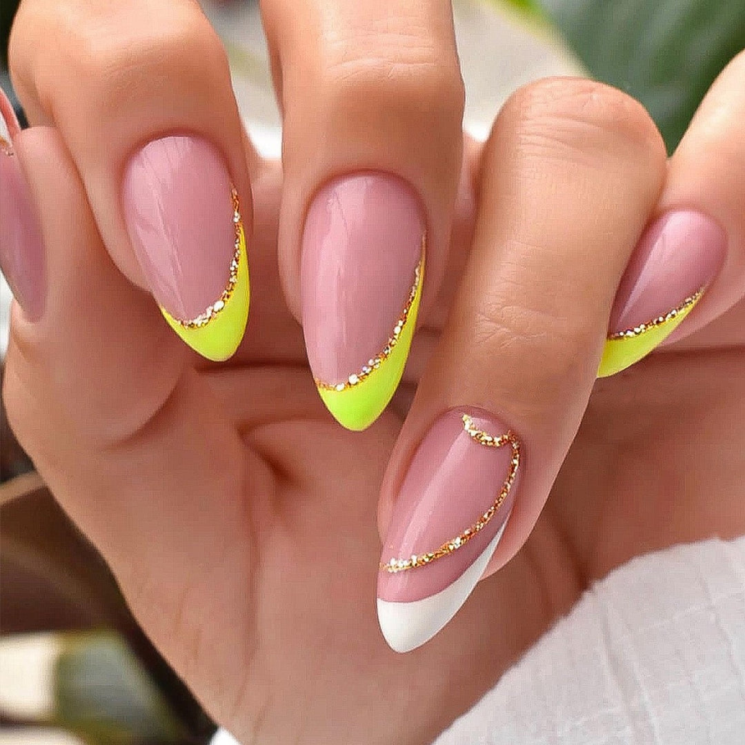 Artificial nail creation with glamorous tips and glitter details Kalsten