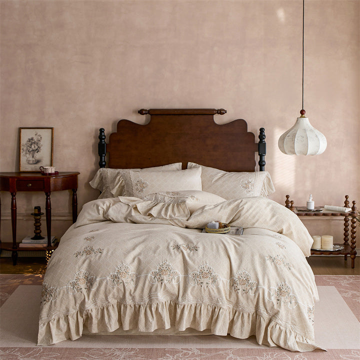 Romantic cotton bedding set with diamond jacquard, embroidered border, and gathered ruffle