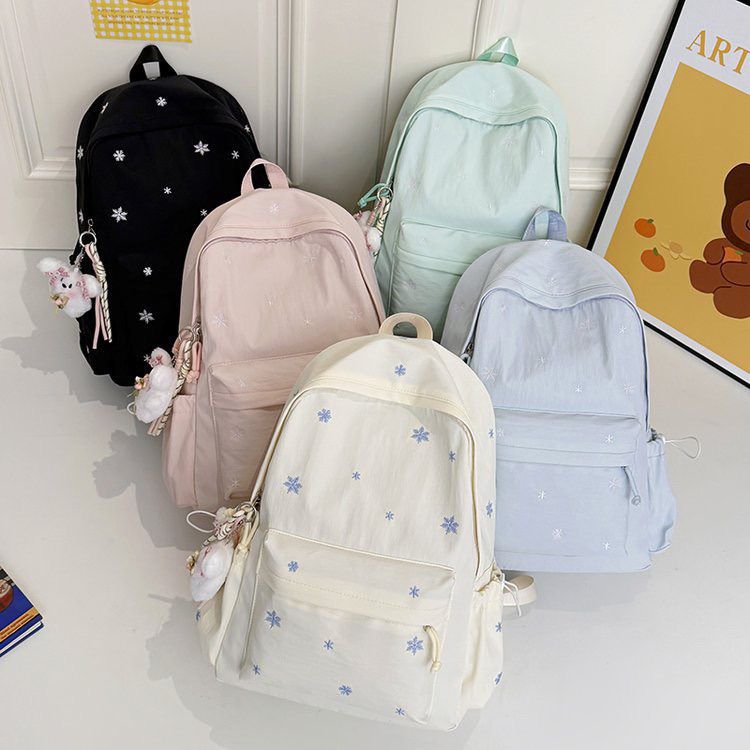 Playful backpack with fine embroidery Kalsten