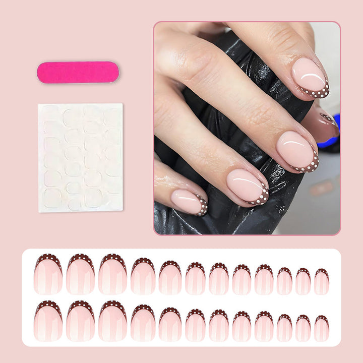 Artificial nail set with elegant French tips and subtle dots Kalsten