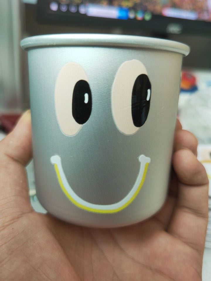 insulated stainless steel smiley-face cup with reusable lid non-slip base and kid-friendly grip Kalsten