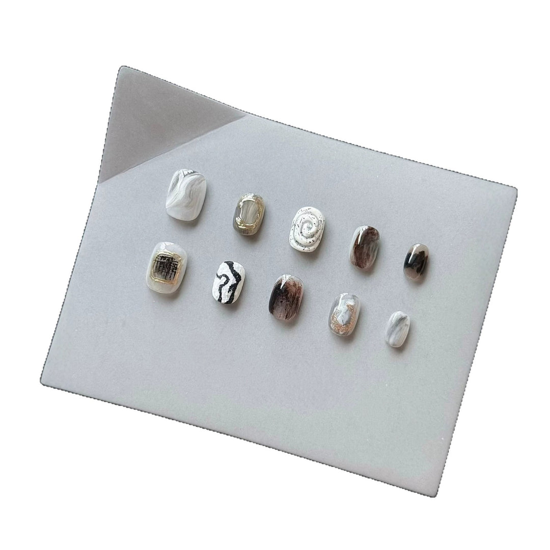 Artistic Press-On Nail Set with Modern Marble and Metallic Accents