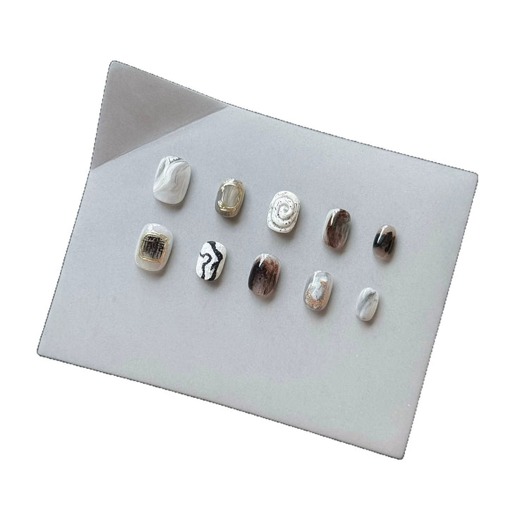 Artistic Press-On Nail Set with Modern Marble and Metallic Accents
