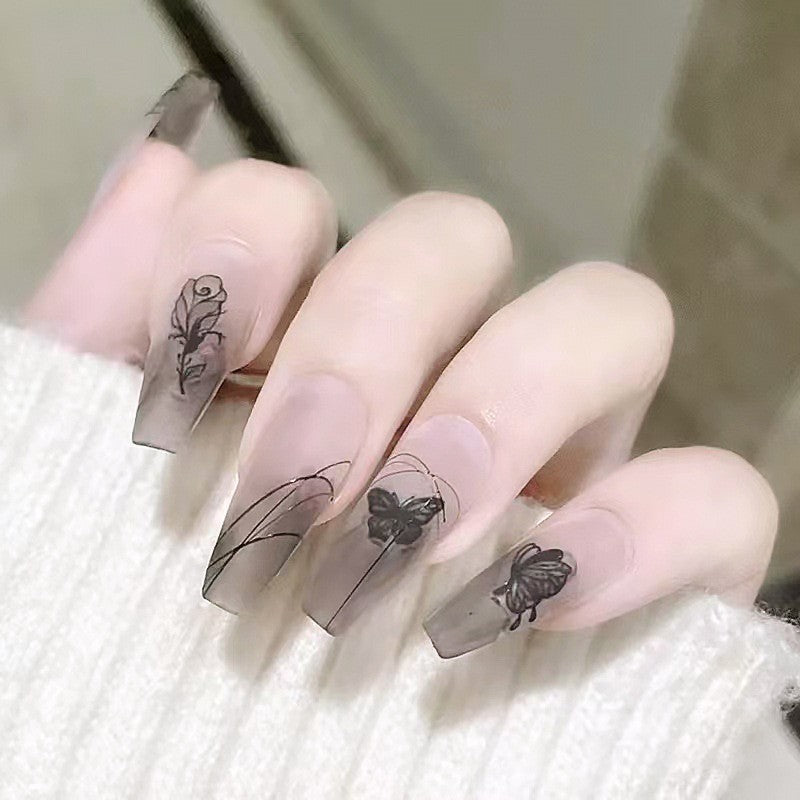 Artificial nail set with elegant flower design and delicate butterfly motifs Kalsten