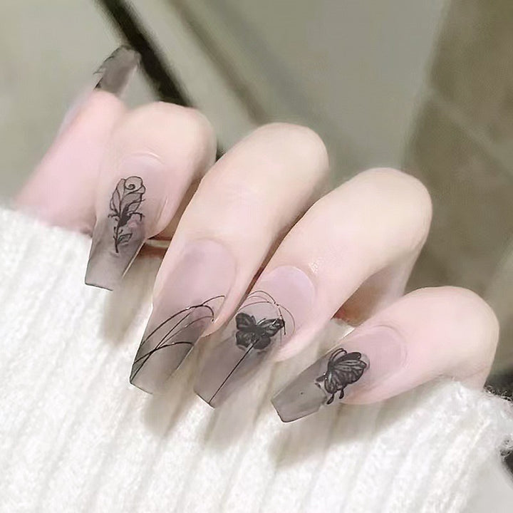 Artificial nail set with elegant flower design and delicate butterfly motifs Kalsten