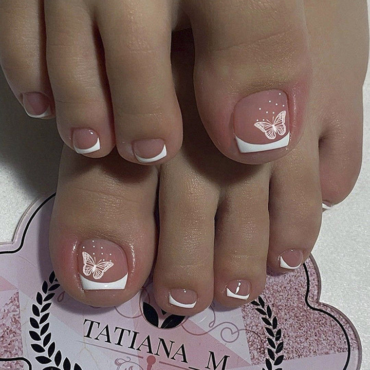 Artful toenail decoration with elegant gold accent Kalsten