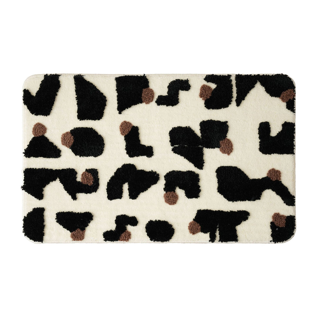 Tufted bathroom mat in abstract leopard pattern with soft high pile Kalsten