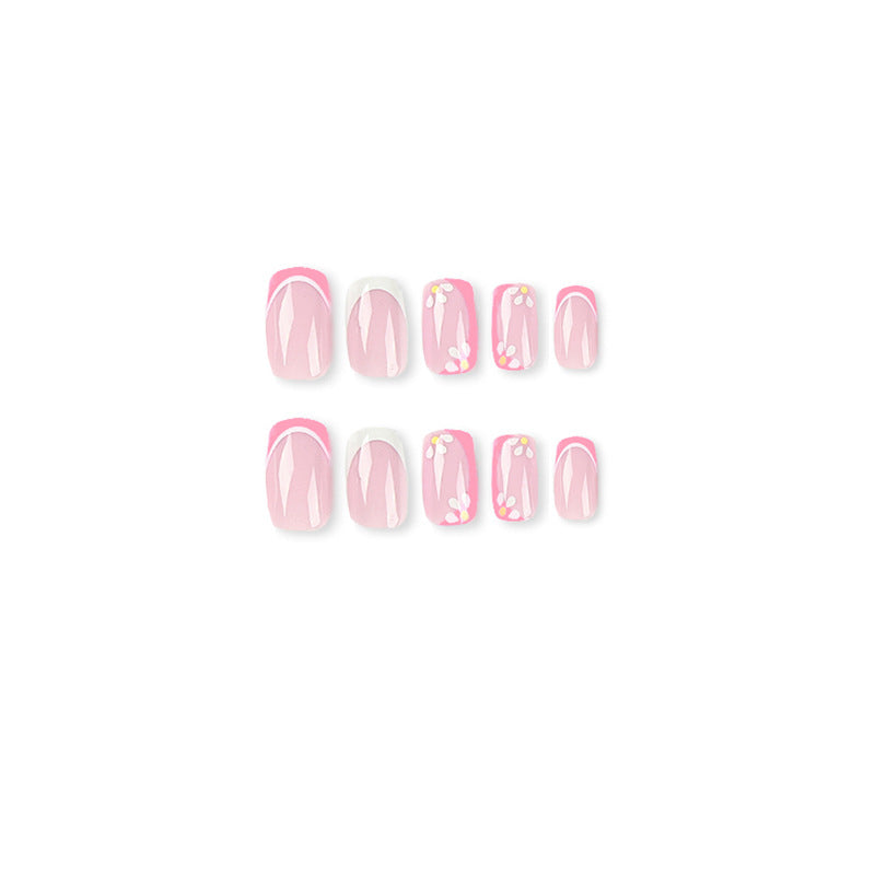 Artistic nail art with floral design and glitter accents Kalsten