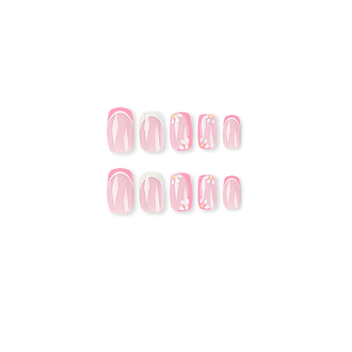Artistic nail art with floral design and glitter accents Kalsten