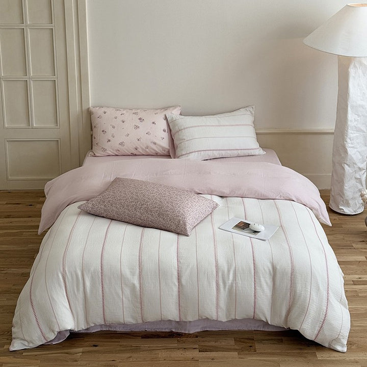 Breathable linen-cotton bedding set with quilted stripes and reversible design