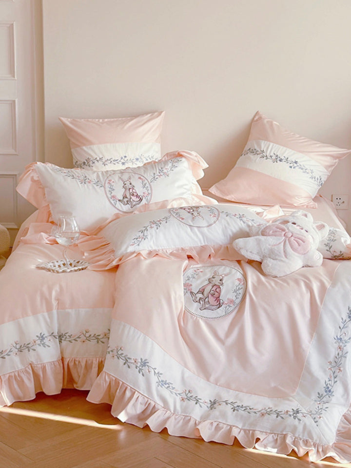 Bedding set with romantic ruffle edge and delicate embroidery