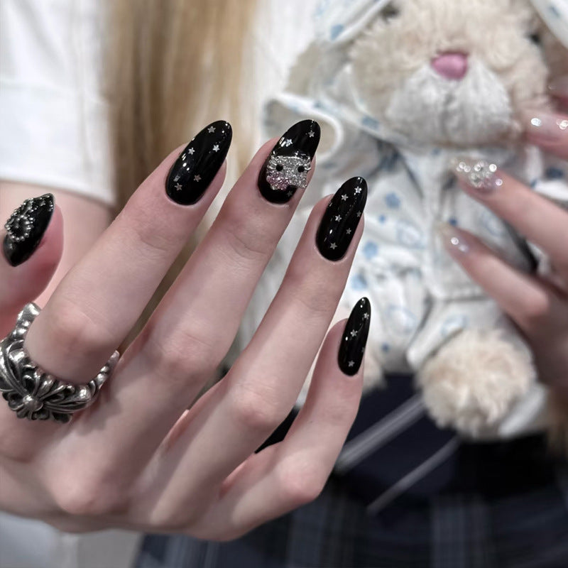 Artistic Press-On Nails with Star and Skull Accents Kalsten