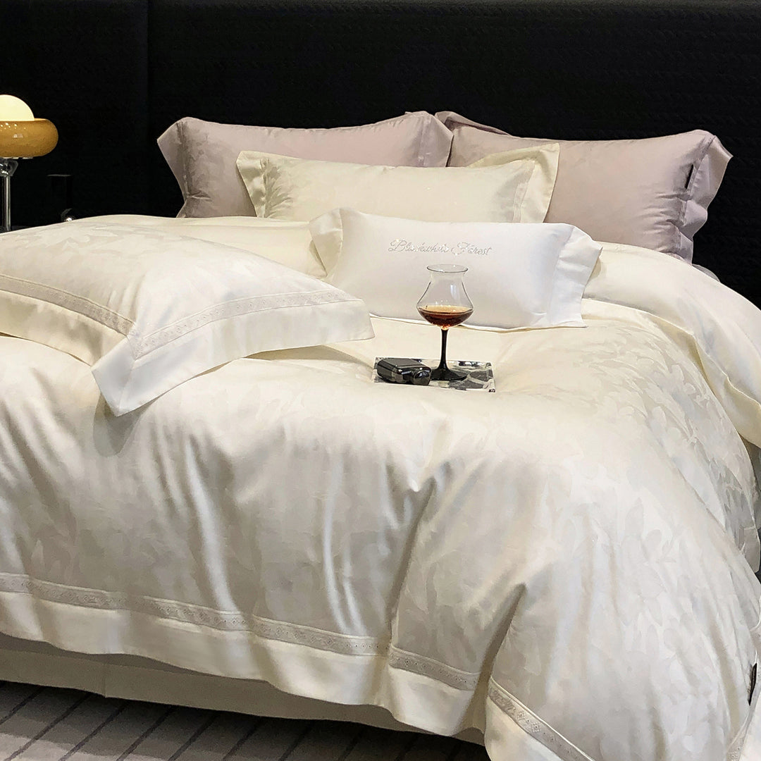 Premium cotton satin bedding set with structured matelassé border and hotel closure