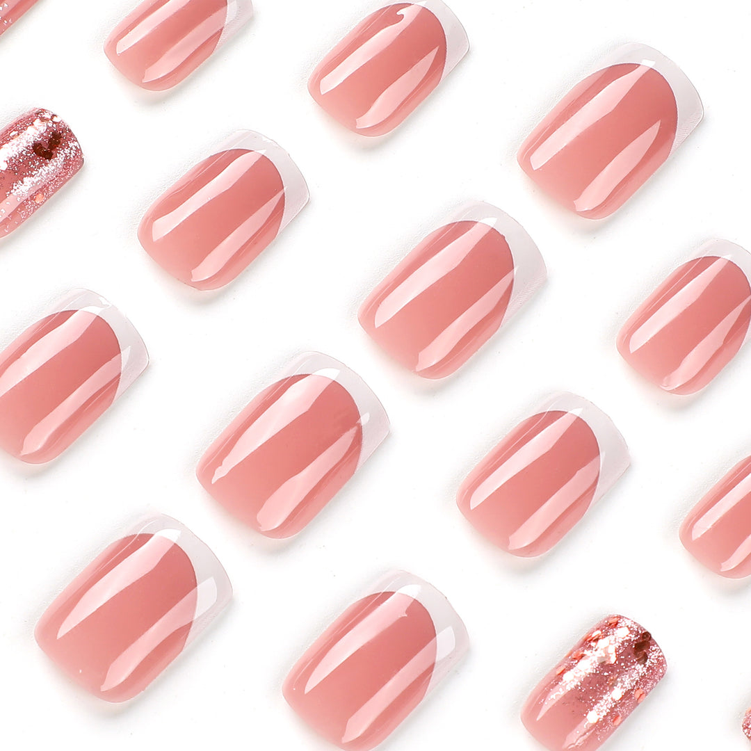 Artful Nail Art with Elegant Glitter and French Tip Accents Kalsten
