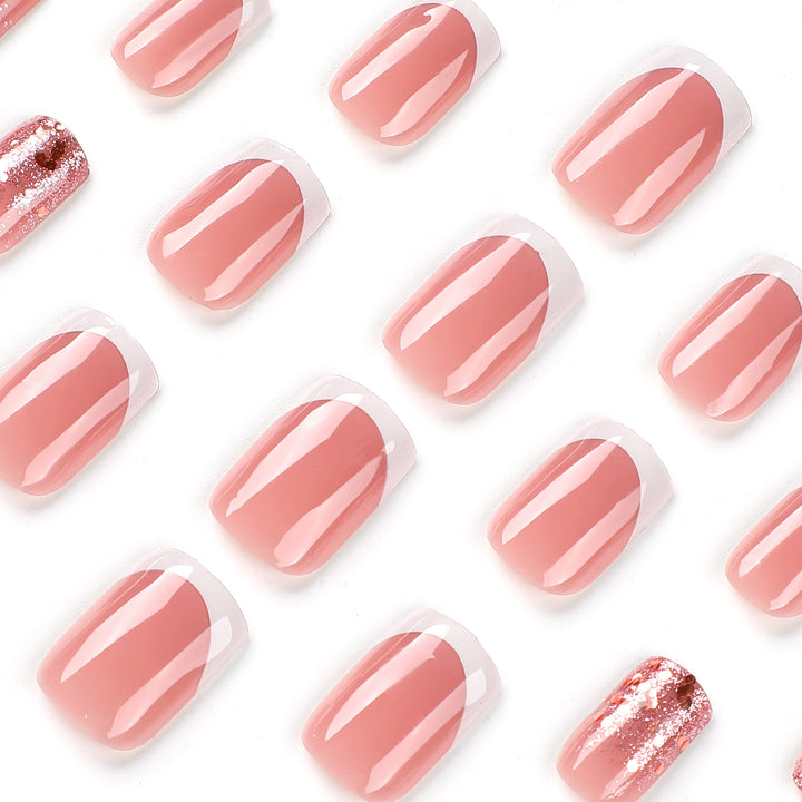 Artful Nail Art with Elegant Glitter and French Tip Accents Kalsten