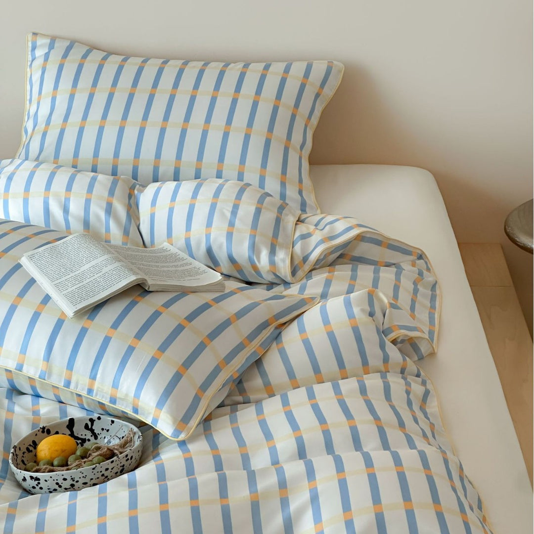 Soft cotton satin bedding with fine check and stripe pattern