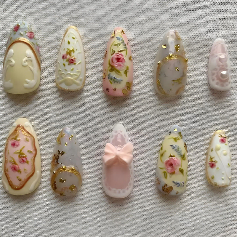 Art nail set with delicate flower and glitter decorations Kalsten