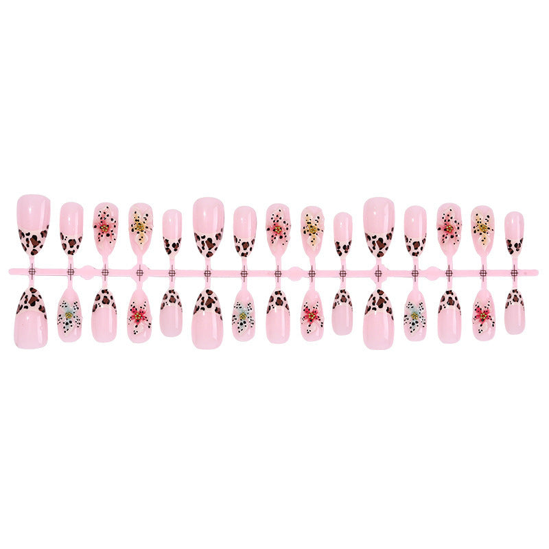 Artificial nail set with exquisite floral design and creative glitter accents Kalsten