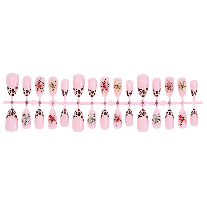 Artificial nail set with exquisite floral design and creative glitter accents Kalsten