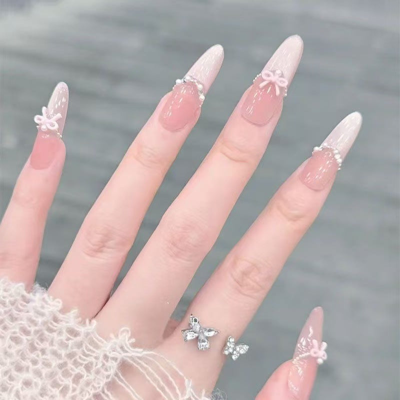 Elegant Stiletto Nail Art Tips with Pearl Accents