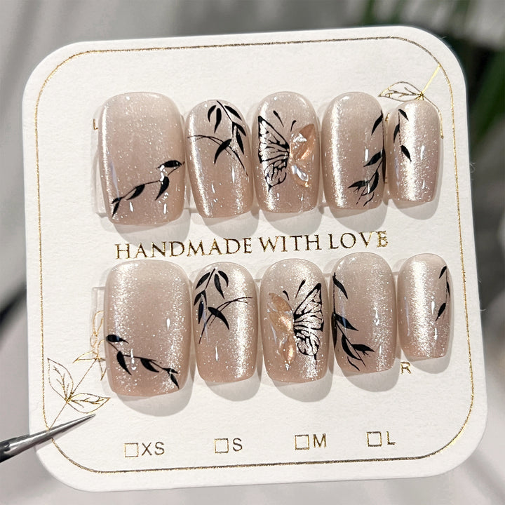 Artificial nail extensions with floral butterfly design Kalsten