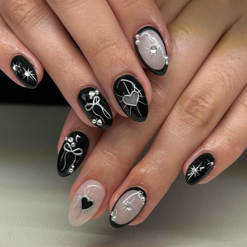 Artificial nail set with elegant bow and heart design Kalsten