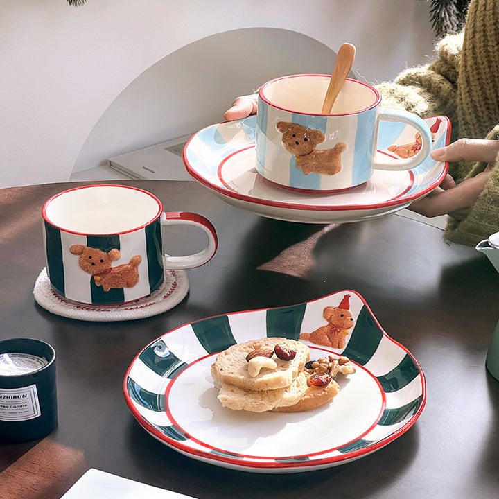 Ceramic cup set with saucer, hand-painted dog motif and wooden spoon