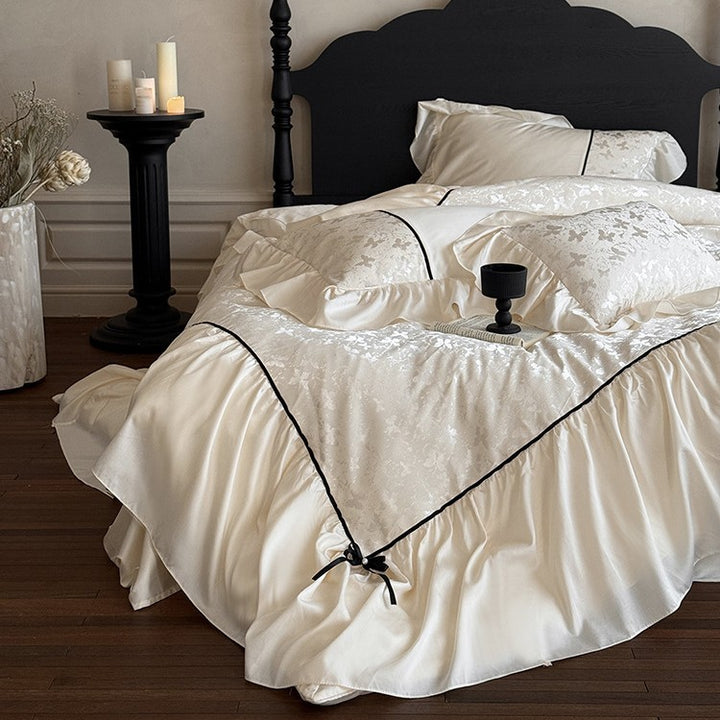 Jacquard bedding set with ruffle, decorative ribbons and fine piping