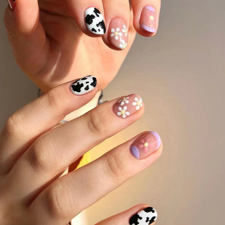 Creative Nail Art with Flower and Animal Designs Kalsten