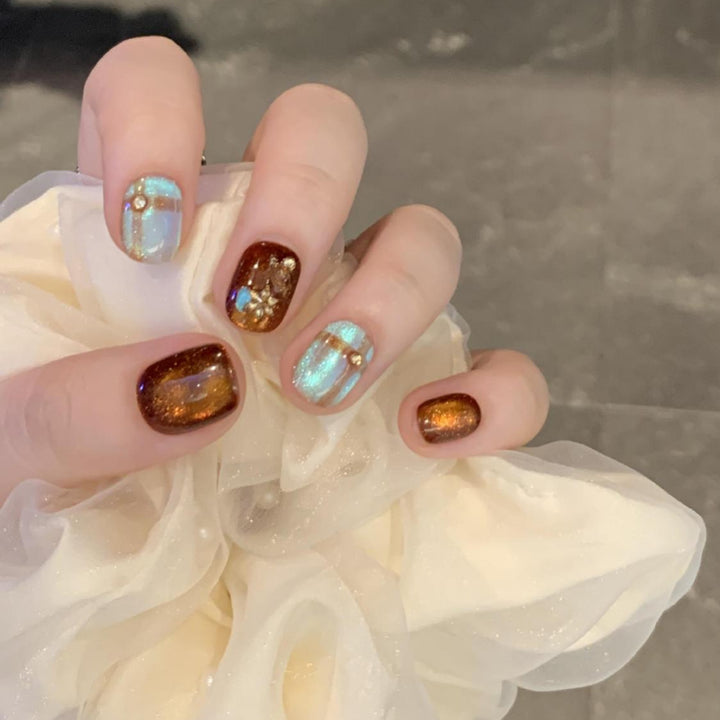 Artificial nail art tips with shimmer and glitter Kalsten