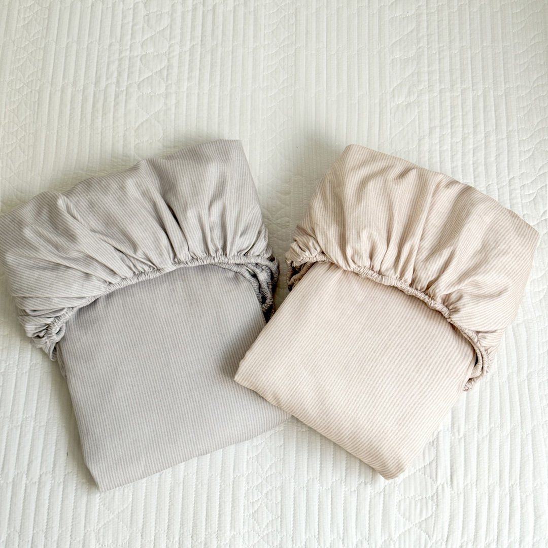 Jersey-fitted sheet with embroidered goose motif and extra-deep hem