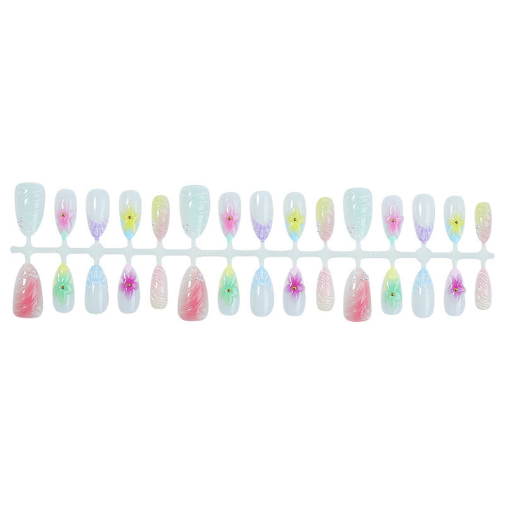 Nail set with colorful floral design and glitter accents Kalsten