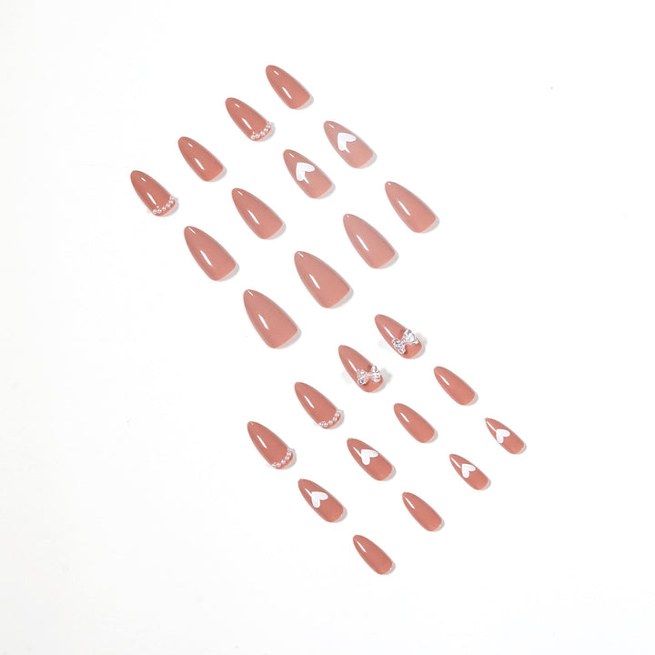 Elegant artificial nails with heart-shaped and glitter accents Kalsten