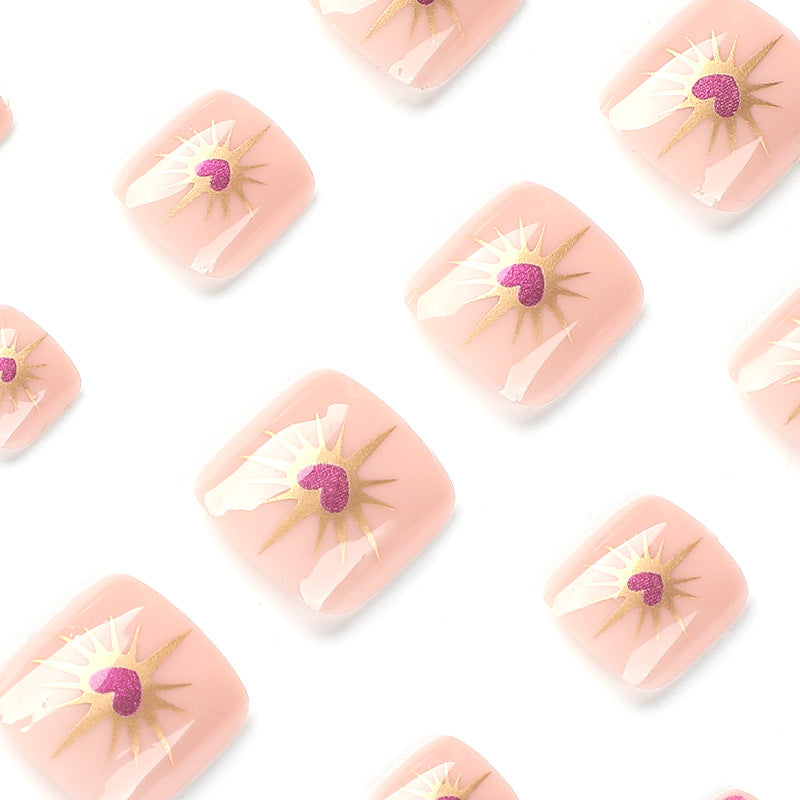 Artistic toenail art with heart and flower design Kalsten