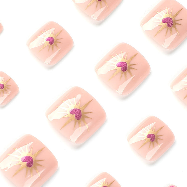 Artistic toenail art with heart and flower design Kalsten