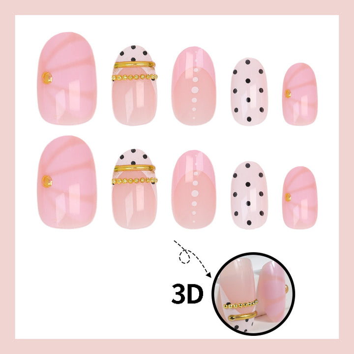 Acrylic nail set with elegant polka dot and glamorous golden accents Kalsten