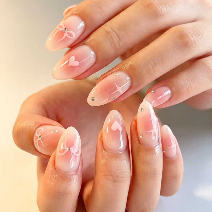 Artificial nails with romantic heart and bow design Kalsten