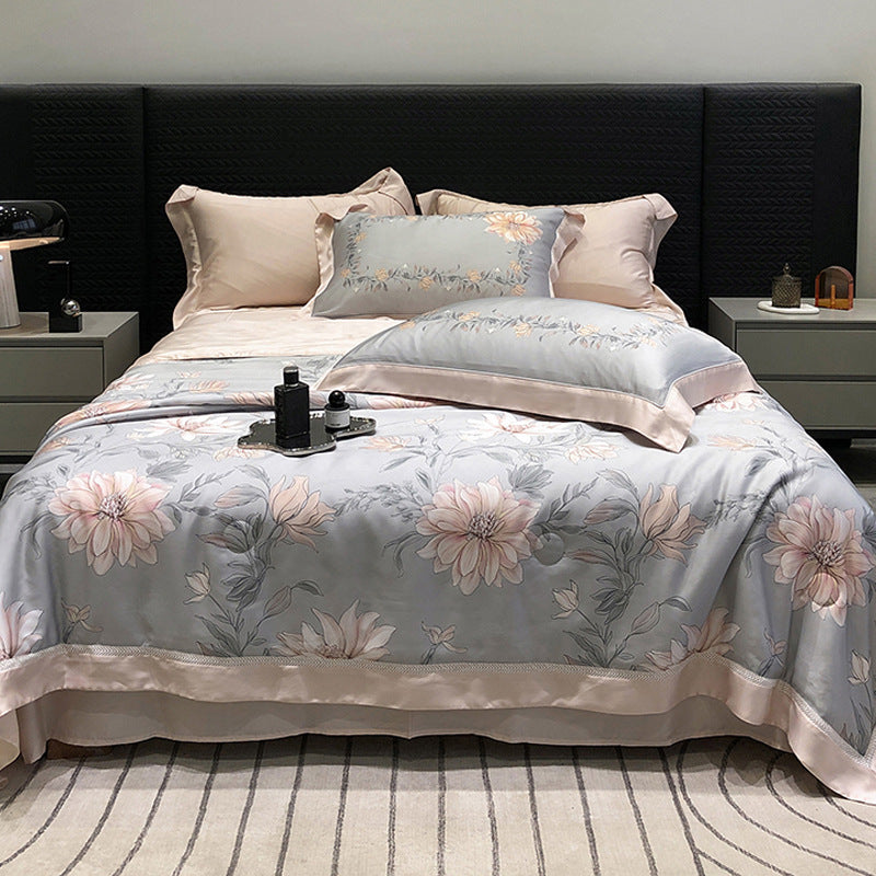 Luxurious cotton satin bedding set with floral watercolor print and fine satin trim