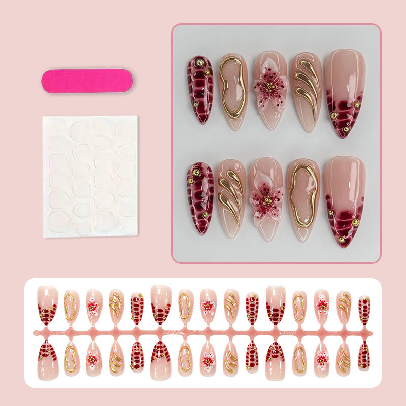 Creative nail art set with floral embellishments and glamorous accents Kalsten