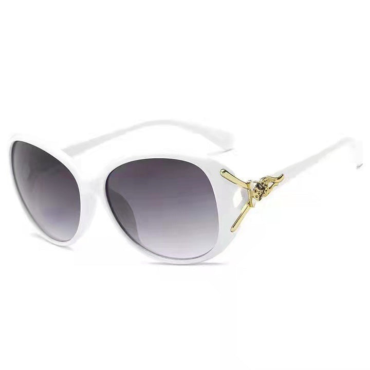 Ladies elegant oversized sunglasses with golden accents Kalsten