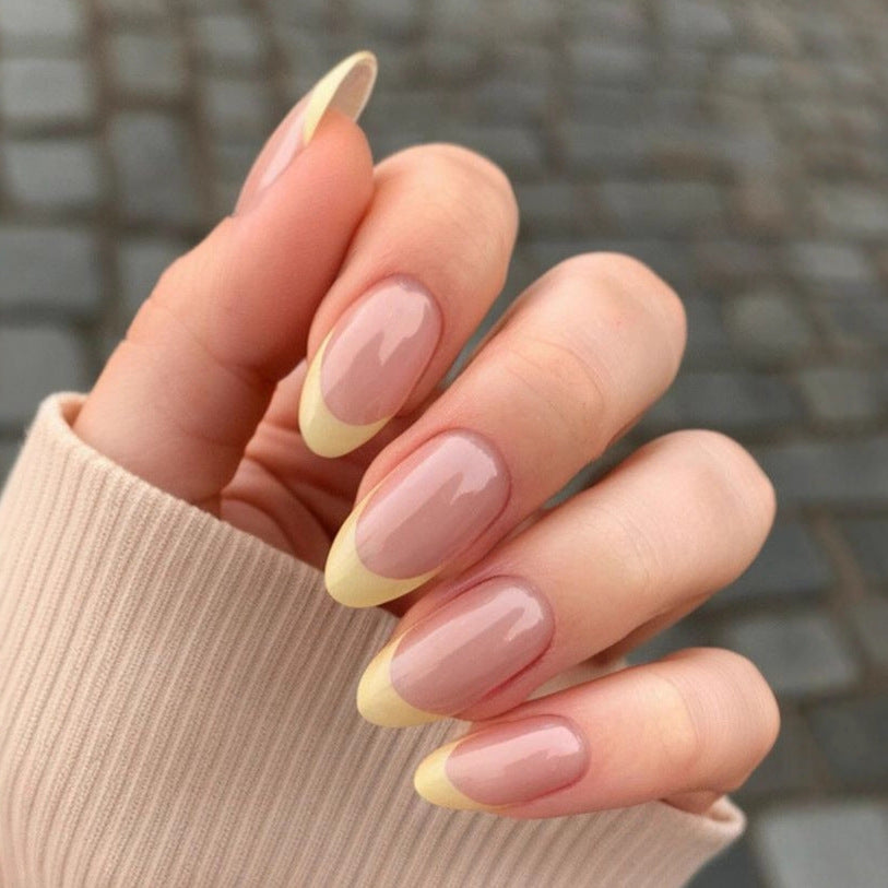 Nail tips with elegant French-tip design Kalsten