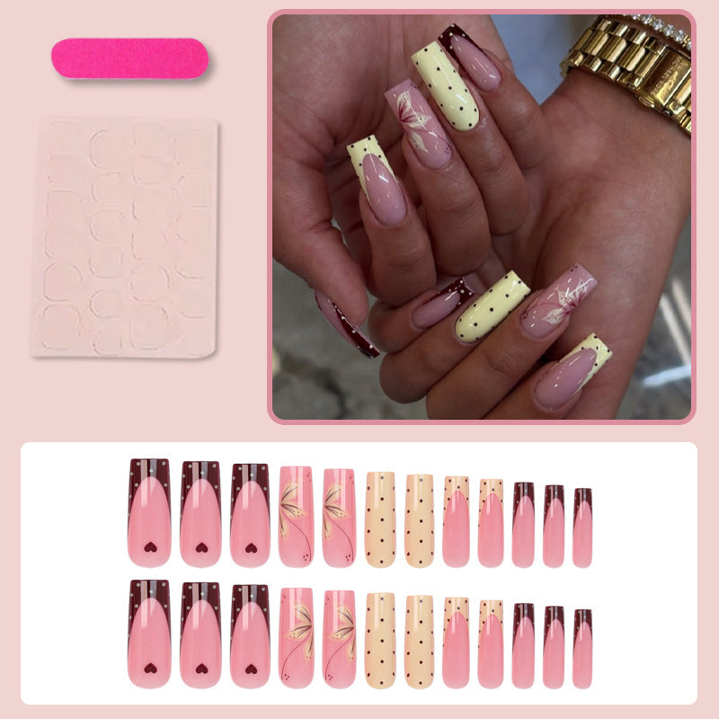 Acrylic nail set with elegant floral and polka dots design Kalsten