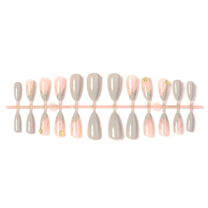 Artificial nail set with elegant marble design and gold accents Kalsten