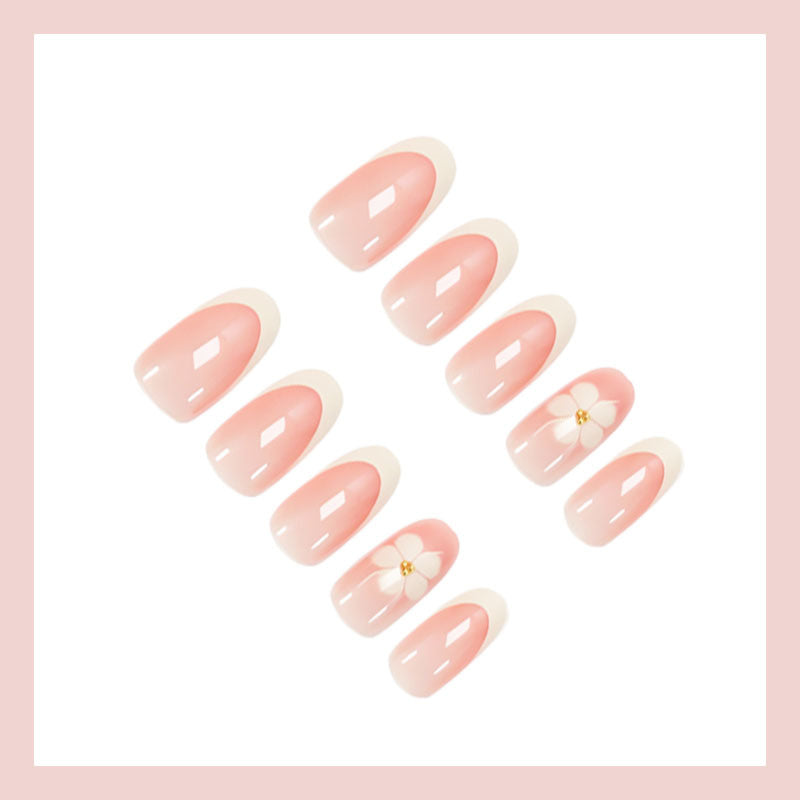 Artificial nail set with elegant flower and French tip embellishments Kalsten