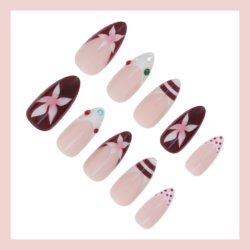 Artificial nail set with floral design and glitter accents Kalsten