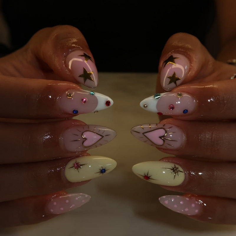 Acrylic nail set with stylish heart and star designs Kalsten