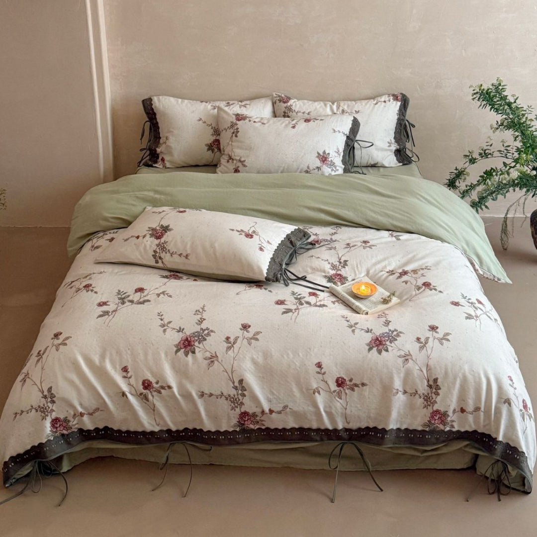 Percale bedding set with floral vintage embroidery, lace trim, and ties