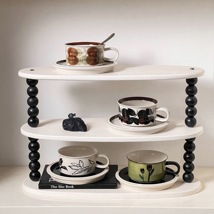 Ceramic cup set with saucer and modern floral print